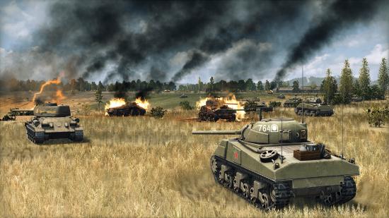soviet tanks advance past destroyed wrecks
