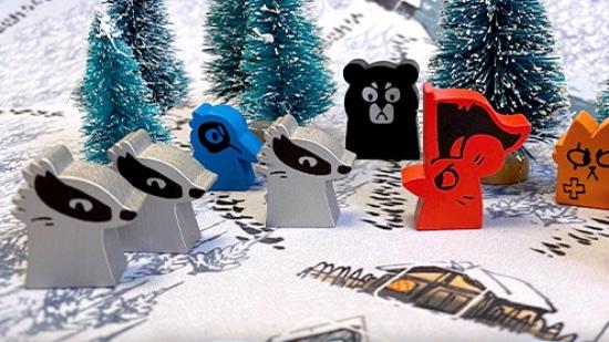Root board game marauder expansion revealed photo of rat and badger game pieces on snowy background