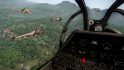 screenshot from Arma 3 Creator DLC S.O.G. Prairie Fire of the view from an aircraft cockpit of several helicopters carrying troops into an operation in the southeast asian jungle