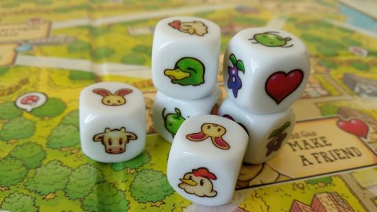 Dice used in Stardew Valley: The Board Games tacked on top of each other