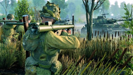 Enlisted screenshot showing USA infantry firing an M1 Bazooka at an enemy tank
