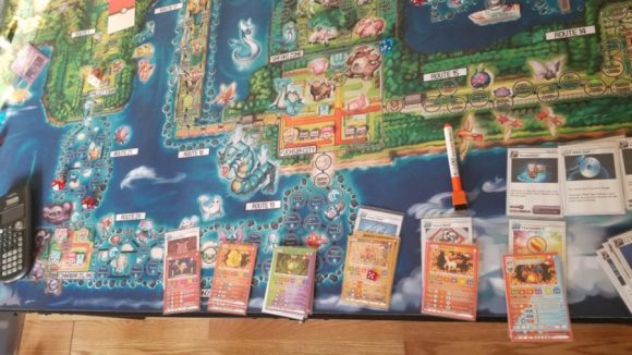 Pokemon board game cards and game table