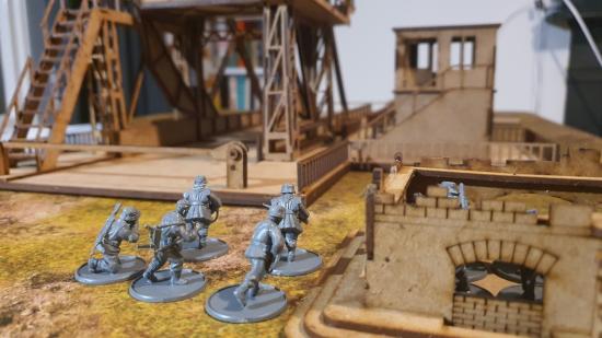 Bolt Action Pegasus Bridge review - photo showing German infantry models facing the bridge
