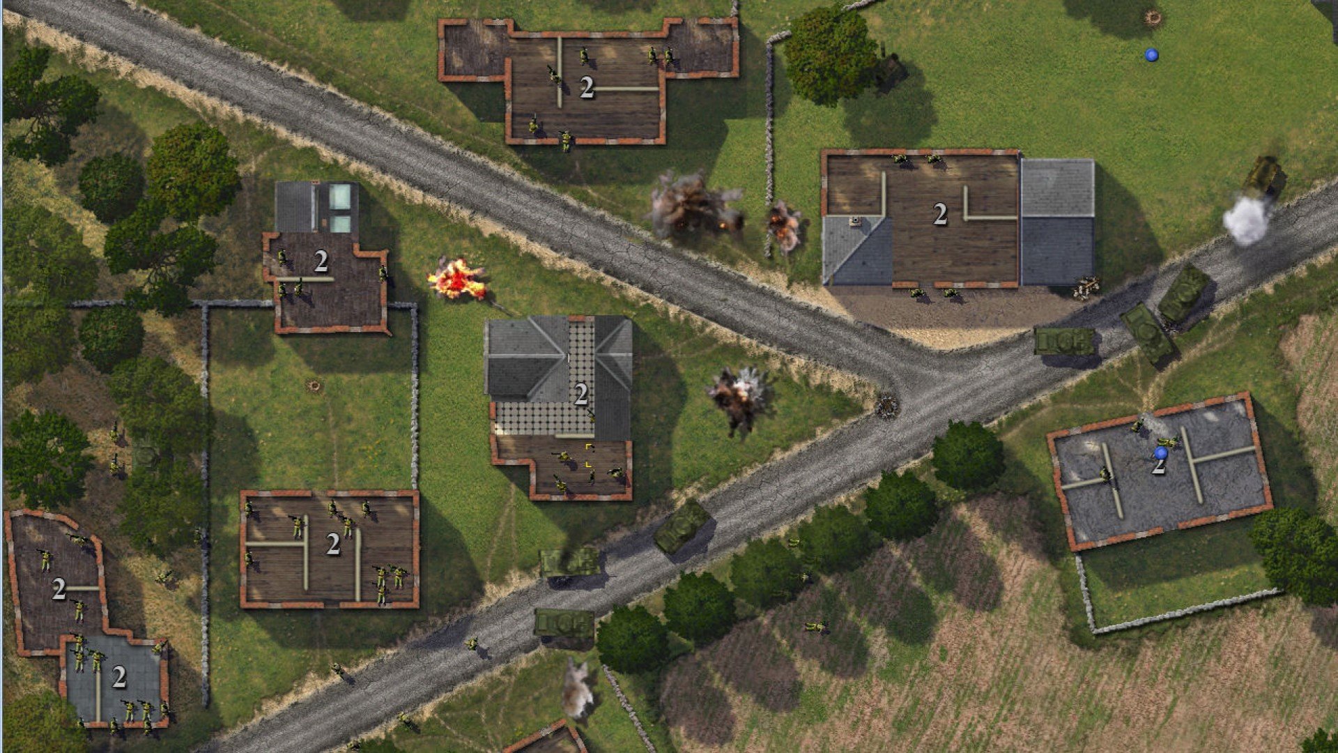 Best WW2 games - screenshot from Close Combat showing an aerial view of a village with opposing squads in position in several buildings