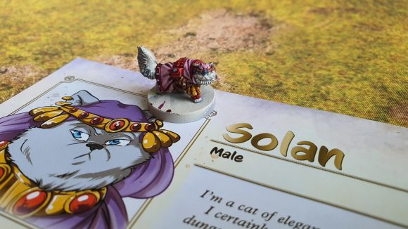 Animal Adventures starter set review - author's photo showing the miniature and character sheet for Solan