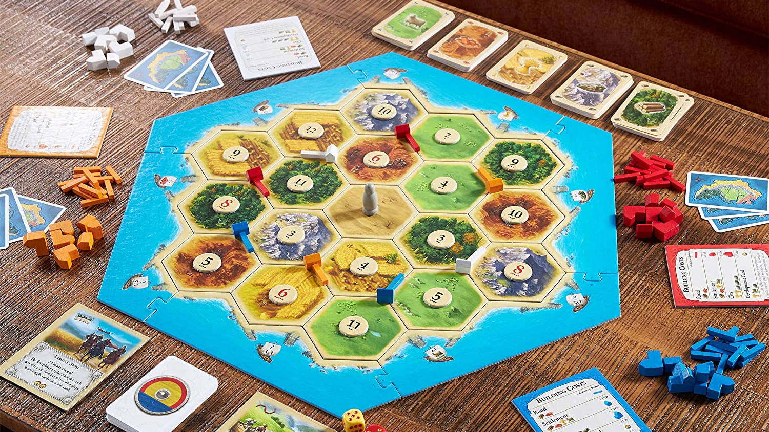 Fun board games Catan board set up on a table, ready to play