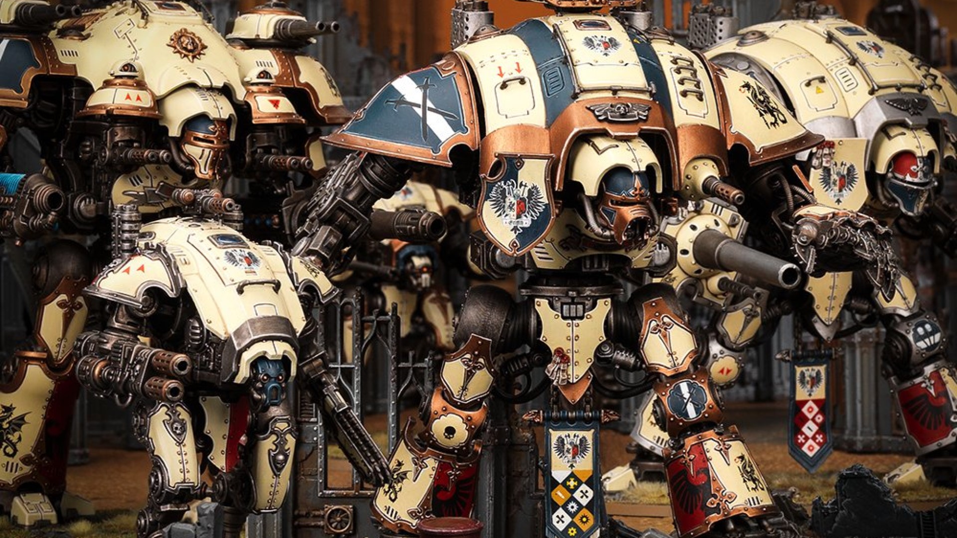 Warhammer 40k Imperial Knights army guide - Warhammer Community photo showing several Imperial Knight models in House Griffith colours