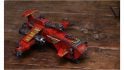 Warhammer 40k Thunderhawk Gunship miniature sitting on a wooden table