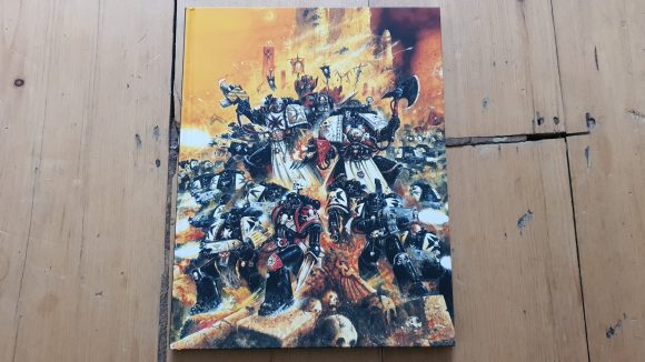 Warhammer 40k Black Templars Army Set review - author photo of the codex front cover artwork by John Blanche