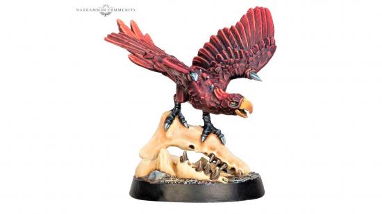Warhammer Underworlds release dates - Warhammer Community photo showing a red parrot miniature perched on a skull