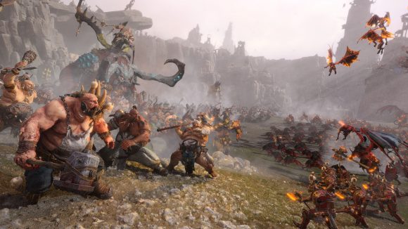 Total War: Warhammer 3 Ogres fighting servants of Khorne