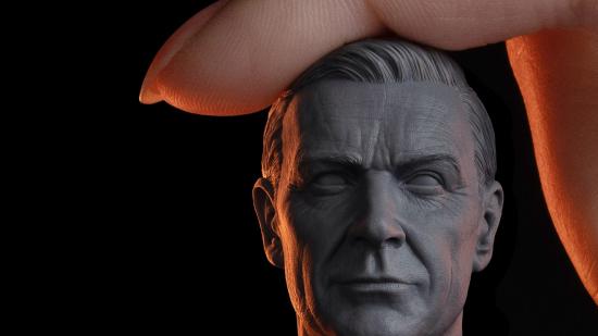 Best 3D printers for miniatures: A finger touching a plastic 3D-printed model head.