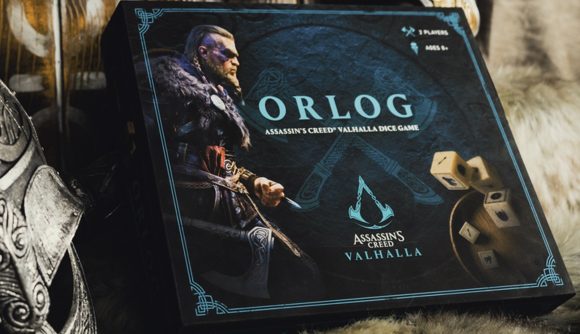 A boxed Orlog dice game laid out majestically.