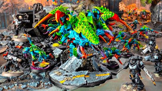 Warhammer 40k Codex Tyranids Crusade Rules - Large green tyranid miniature surrounded by soldiers in black
