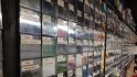 Magic the Gathering all commander decks: A huge number of commander decks, spanning an entire wall.