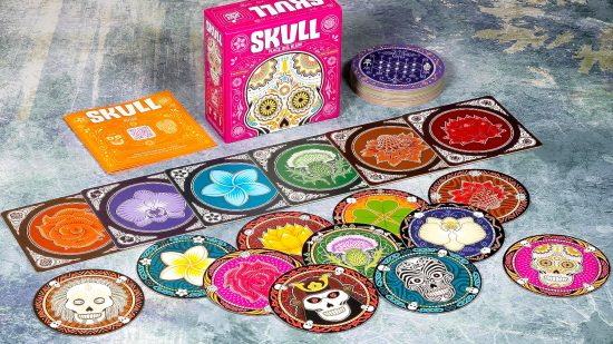 Best drinking board games guide - Skull card game sales photo showing the box and circular Skull cards laid out on a gray surface