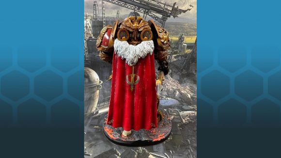 Warhammer 40k Henry Cavill custodes action figure - photo by the figure's creator Simon Cook, shared on the Warhammer 40k For All Facebook group, showing the figure's back, and red cape