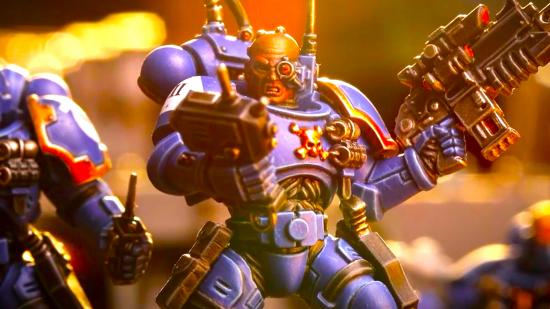 Warhammer 40k Kill Team - a space marine in blue armour, holding a gun