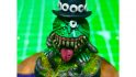 Warhammer 40k squig Pokemon - a squig mini customised to look like The Hitcher from The Mighty Boosh, who has green skin, a black top hat, and a white circle around one eye