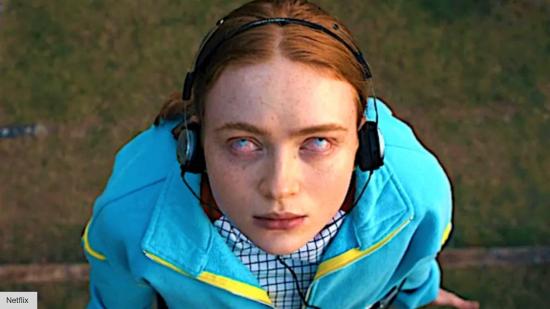 Tales from the Loop Stranger Things Kate Bush - a close-up of Max, who is possessed and wearing headphones, in Stranger Things Season 4