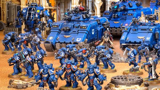 Games Workshop profits 2022 share bonus - Warhammer Community photo showing an army of Ultramarines space marines models