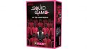 The box for the Squid Game board game, showing the Netflix show's masked characters in pink hoodies surrounding a person in a black mask and hoodie
