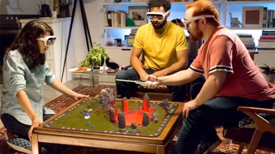 Catan Tilt Five AR hologram reveal - publisher photo showing people playing a board game using Tilt Five