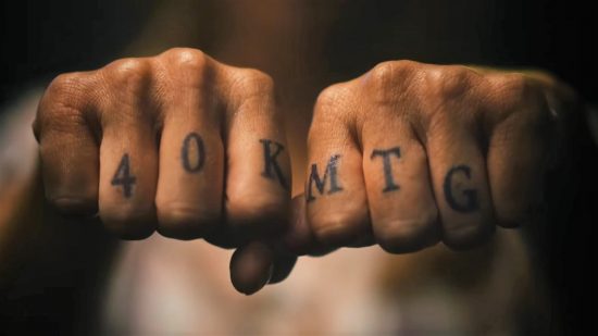 MTG warhammer 40k tattooed onto someone's knuckles