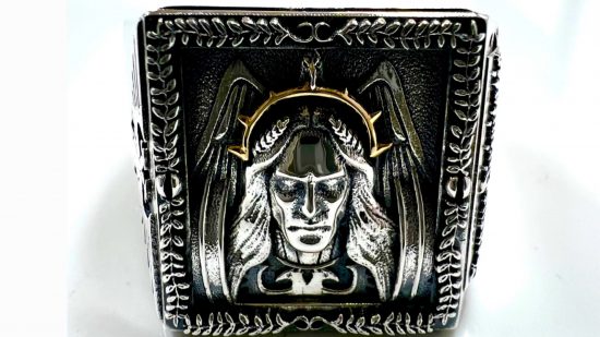 A Warhammer 40k signet ring featuring the emperor of mankind