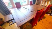 Best gaming tables guide - GeekNSon Megan - author's photo of the Megan table's full dining surface including counter leaf