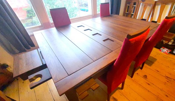 Best gaming tables guide - GeekNSon Megan - author's photo of the Megan table's full dining surface including counter leaf