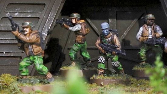 Best miniature wargames - Star Wars Legion, a photo by Atomic Mass Games showing models of rebel troopers in the doorway of a power generator bunker