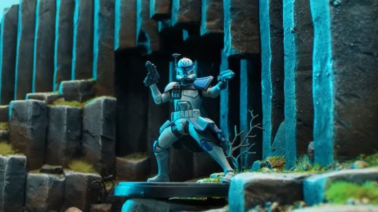 Star Wars Shatterpoint - Jango fett miniature on terrain that looks like basalt column