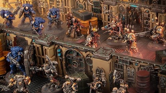 Warhammer 40k Arks of Omen - Games Workshop image showing Ultramarines space marines fighting Black Legion Chaos Space Marine models in a Boarding Actions game
