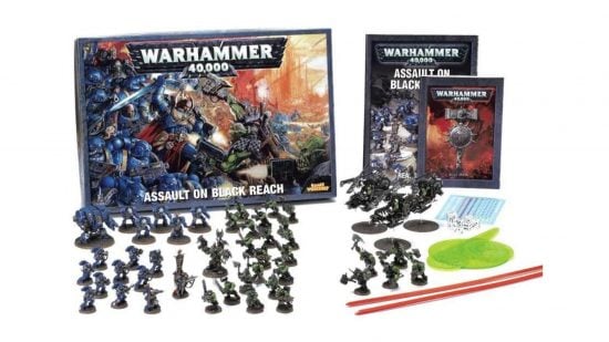 Warhammer 40k Assault on Black Reach starter set - a collection of Space Marines and Orks in front of a box