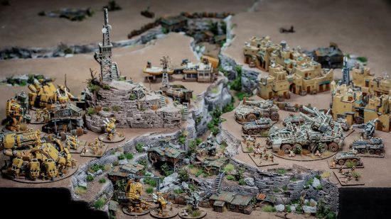 Full Spectrum Dominance is like Warhammer 40k meets Total Annihilation - photo of models by the Lazy Forger, tiny models representing two huge armies face off across a gorge