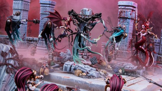 Nighthaunt army guide - photo by Games Workshop of a small army of model ghosts led by a Krulghast Cruciator, a ghost shackled to a rack