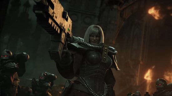 Warhammer 40k Amazon film deal in principle - still from CGI trailer by Games Workshop, a Sister of Battle points a large boltgun towards the camera. She wears dark, powered armour, a roseary affixed to her waist.