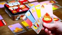 Best cheap board games guide - publisher sales photo showing the cards from Sushi Go Party board game in play
