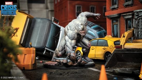 Marvel Crisis Protocol Rhino model by Atomic Mass Games - a miniature of a man in an enormous rhino costume, smashing up the pavement