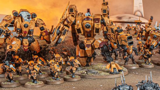 Warhammer 40k Tau Empire army guide - Games Workshop image showing a Tau Sept army including Riptide and Ghostkeel battlesuits