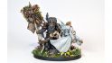 Warhammer 40k wedding cake topper - an inquisitor bride and death guard groom on a flower-covered base - back view