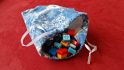 Azul board game review - author photo showing the tile bag open, showing the tiles inside