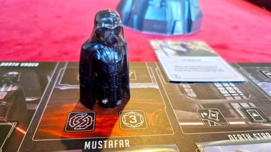best Star Wars board games guide - author photo showing the Darth Vader player board, mover, and cards from Star Wars Villainous