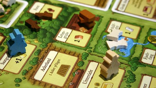 Board game types - Agricola meeples on board