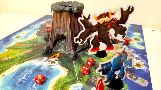 King of Monster Island board game review - author photo showing the game board, volcano dice tower, and lavalord boss