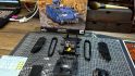 Warhammer 40k Space Marine tank remote control - photo of a converted Razorback by Brent Goudie, in a state of disassembly - mechanical components are visible