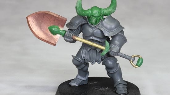 Warhammer Age of Sigmar Shovel Knight mini conversions - creator photo showing a work in progress stage of the shovel knight mini, using green stuff