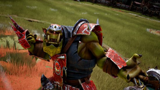 Blood Bowl 3 online bug fixes coming - an Orc prepares to punch someone