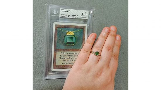 Magic the Gathering - a wedding ring next to a mox emerald MTG card